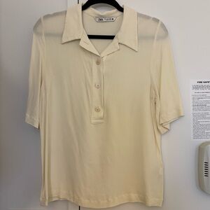 Short sleeve button down sheer blouse